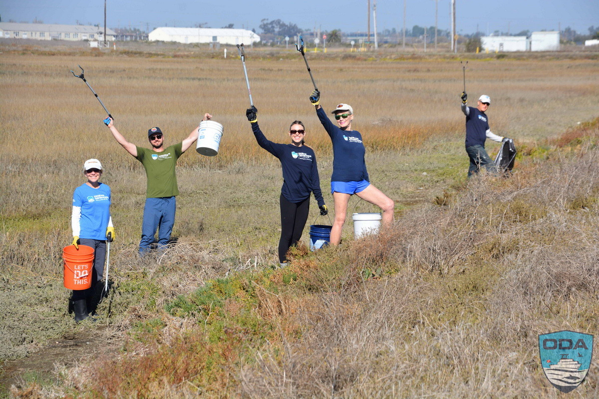 Pete and the cleanup crew removing rubbish from a protected wetlands.