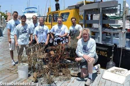 2012-05-31 Backyard Cleanup Campaign, on the dock in front of the <em>Clearwater</em>. The hardworking volunteer crew of ODA (left to right): Andy The, Shingo Ishida, Steve Millington, Phil Koehler, Peter Fulks, Billy Arcila, and Captain Kurt Lieber. More debris removed from the oceans means cleaner, safer habitat for marine wildlife!