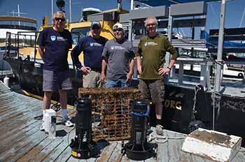 Ocean Defenders Alliance Dive & Boat Crew with their "prize": Kurt Lieber, Al Laubenstein, Jeff Connor, and Jim Lieber