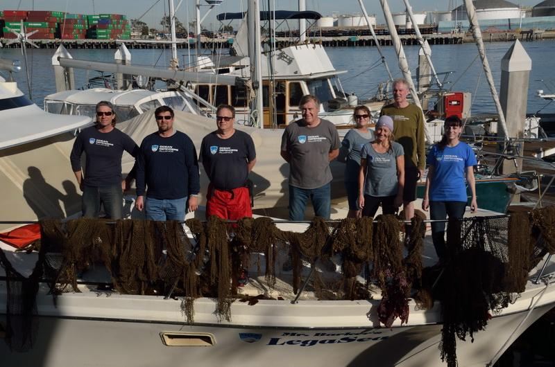 The entire ocean conservation crew with marine debris removed