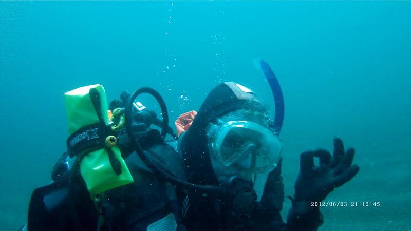 ODA SCUBA Diver removes ghost gear