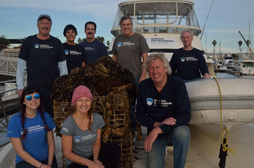 Ocean Defender Crew with recovered traps and net