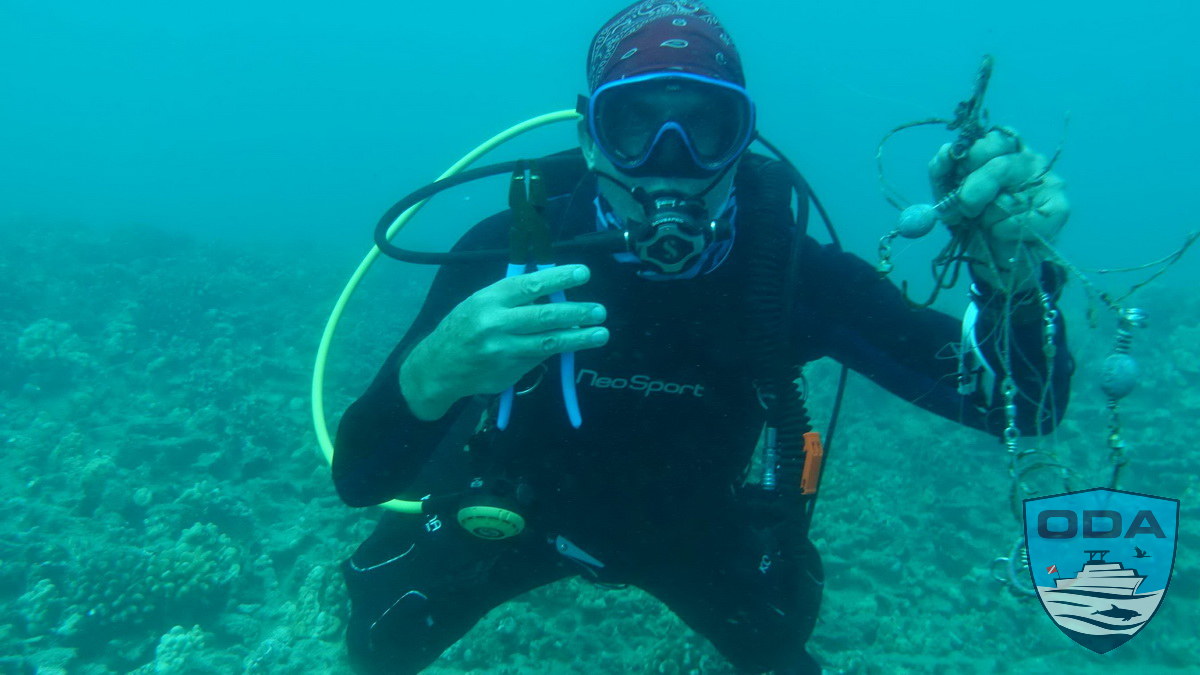ODA dive volunteer removes fishing hooks