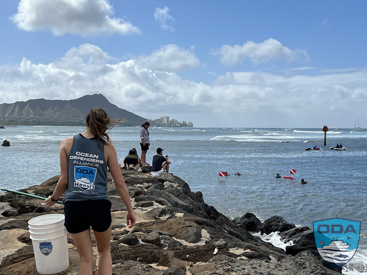 ODA Oahu volunteer cleans pier of trash