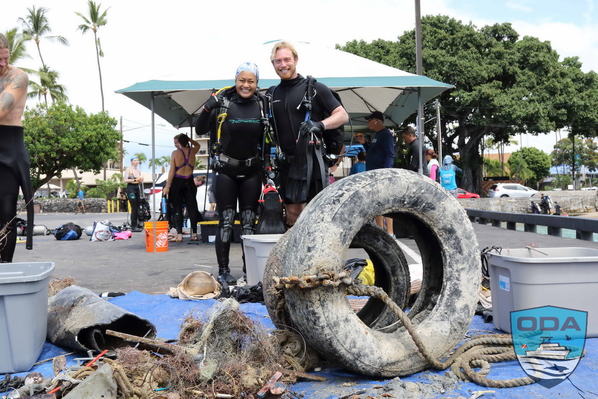 Volunteer divers part of team hauling out toxic tires and more