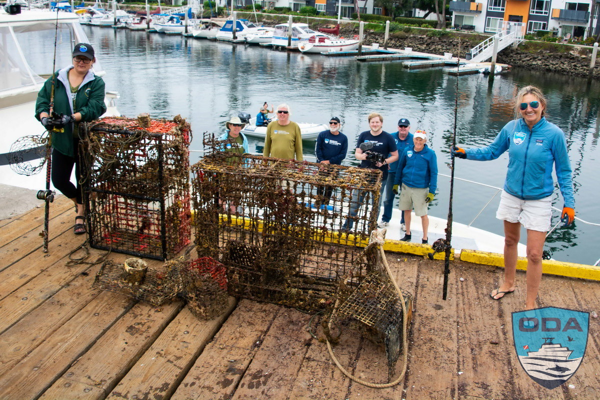 Crew with Catch of the Day lined up on the dock