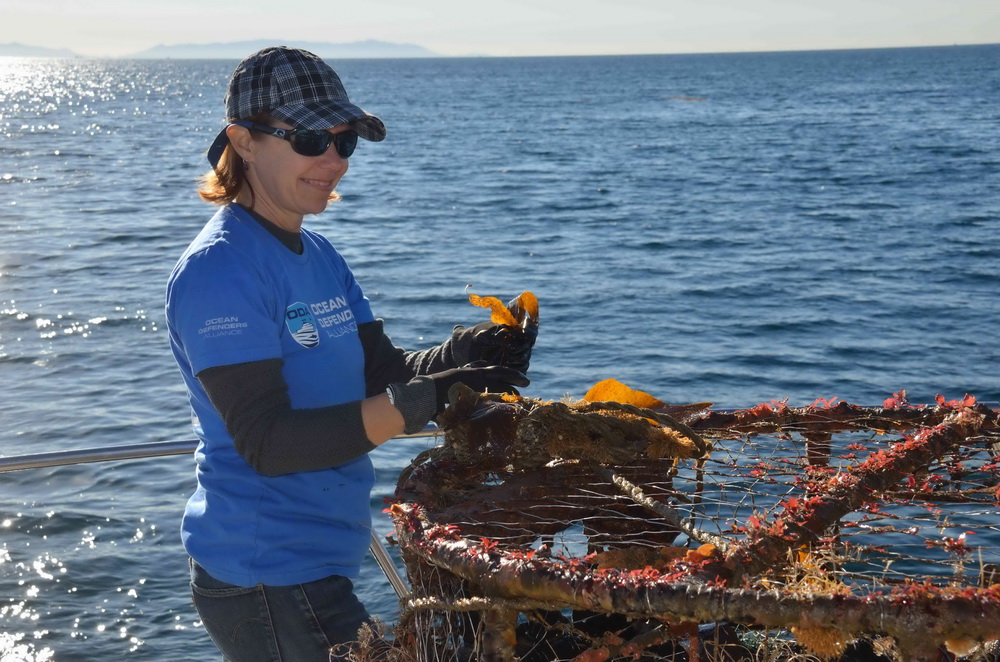 Karla on boat w traps